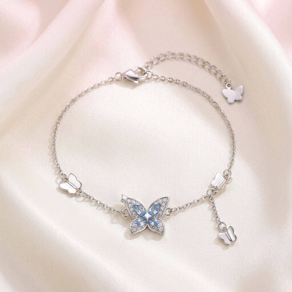 Butterfly bracelet on ivory satin
