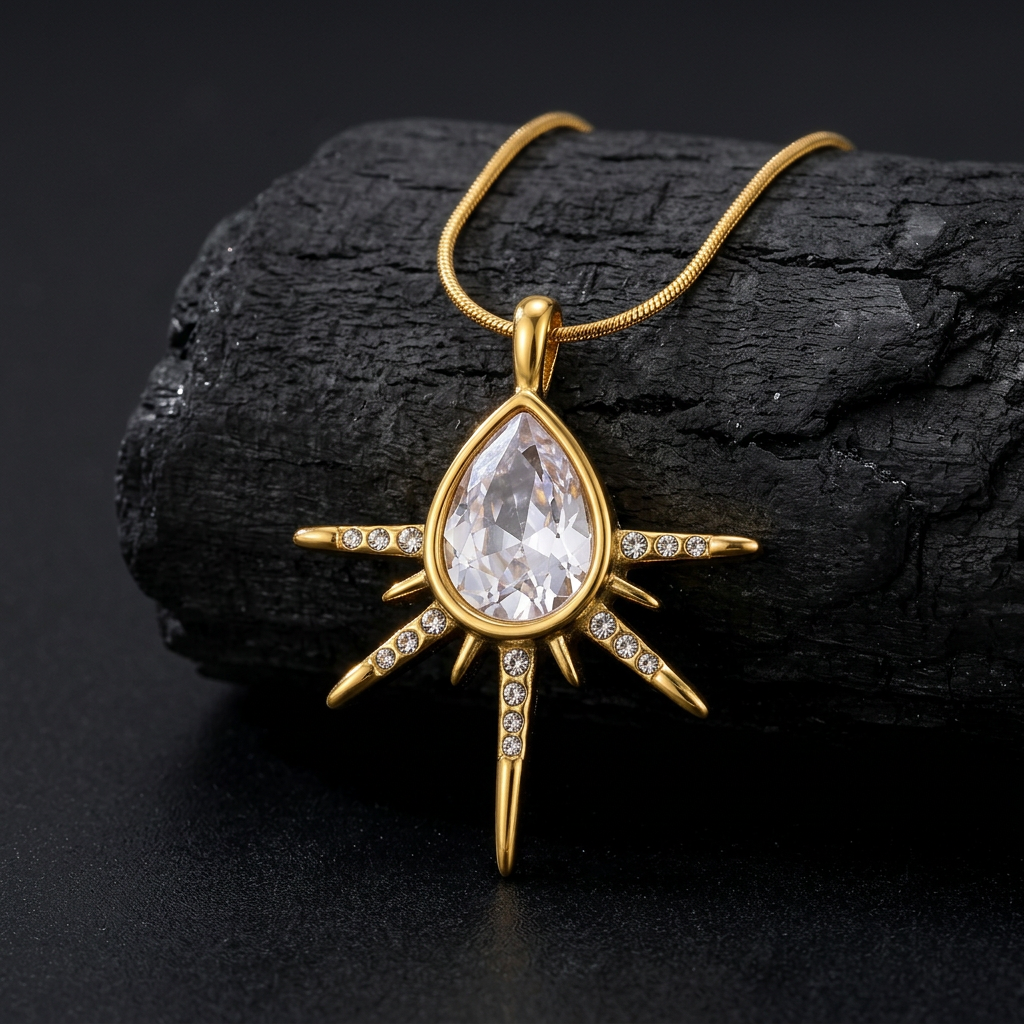 Close-up of clear teardrop center and sunburst rays on charcoal stone