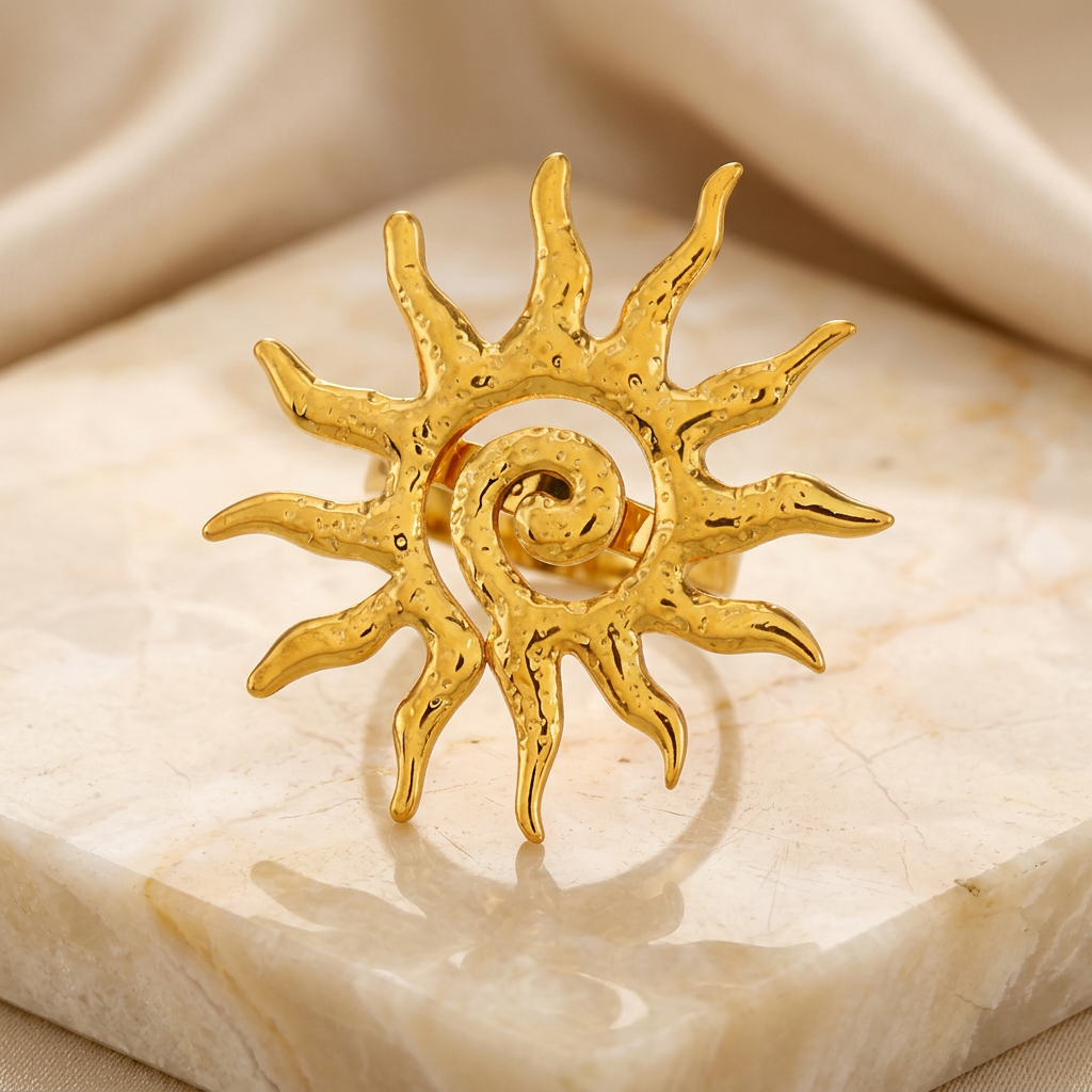 Gold-tone spiral sun statement ring on ivory stone