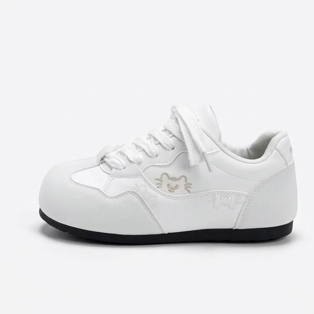 White cat-detail sneaker side view